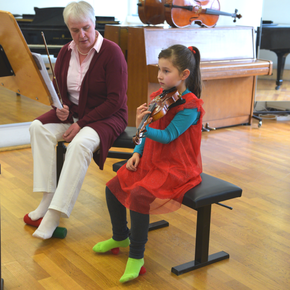 Using foot rollers while practing the viola